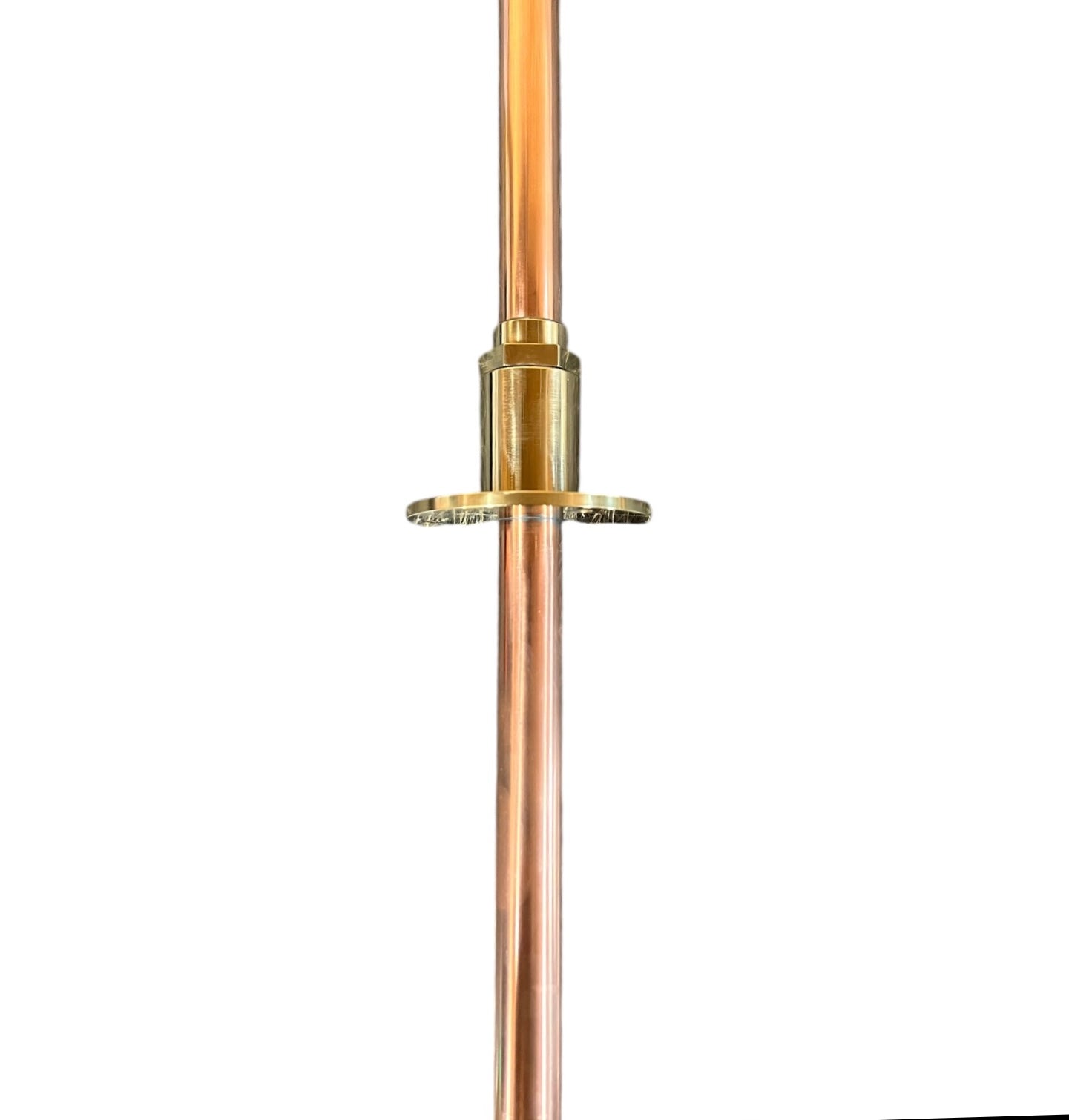 Copper pipe with brass fitting on a white background