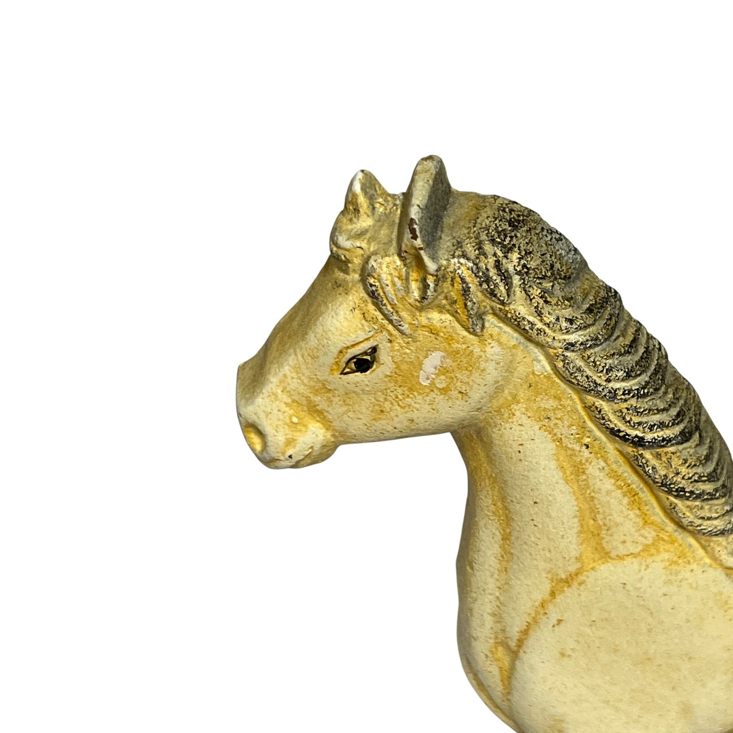 A close-up side profile of a decorative horse figurine in a textured cream and gold finish, set against a plain white background.