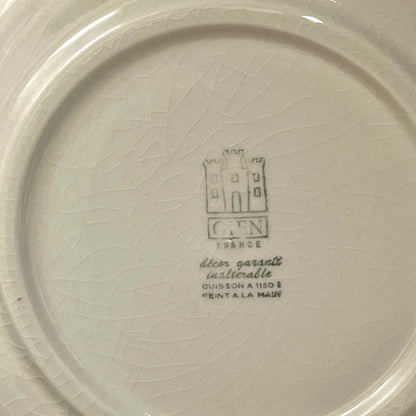 Ceramic plate with a brand logo and text on a white background