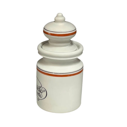 White ceramic jar with a lid on a white background