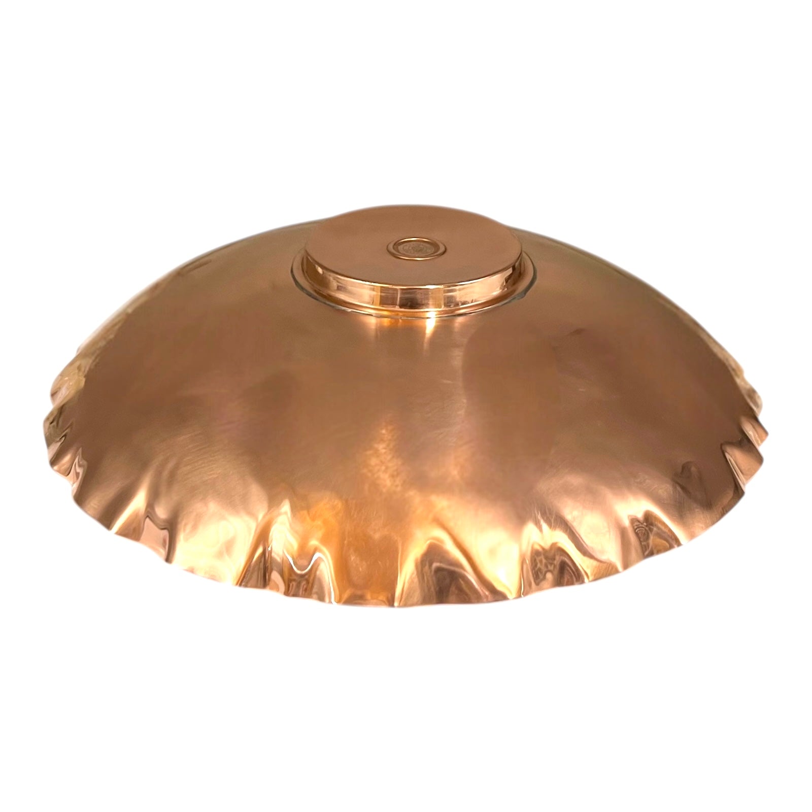 copper fruit bowl on a white background