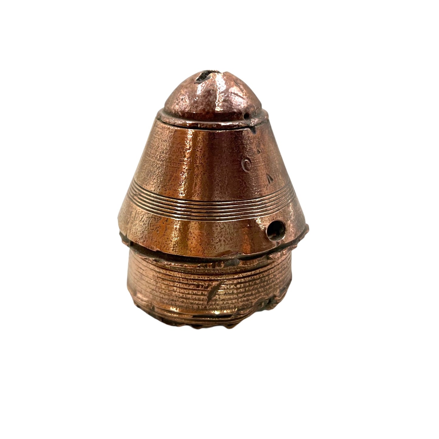 WW1 brass fuse paperweight on a white background