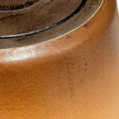 Close up of Le Creuset pan on a white background