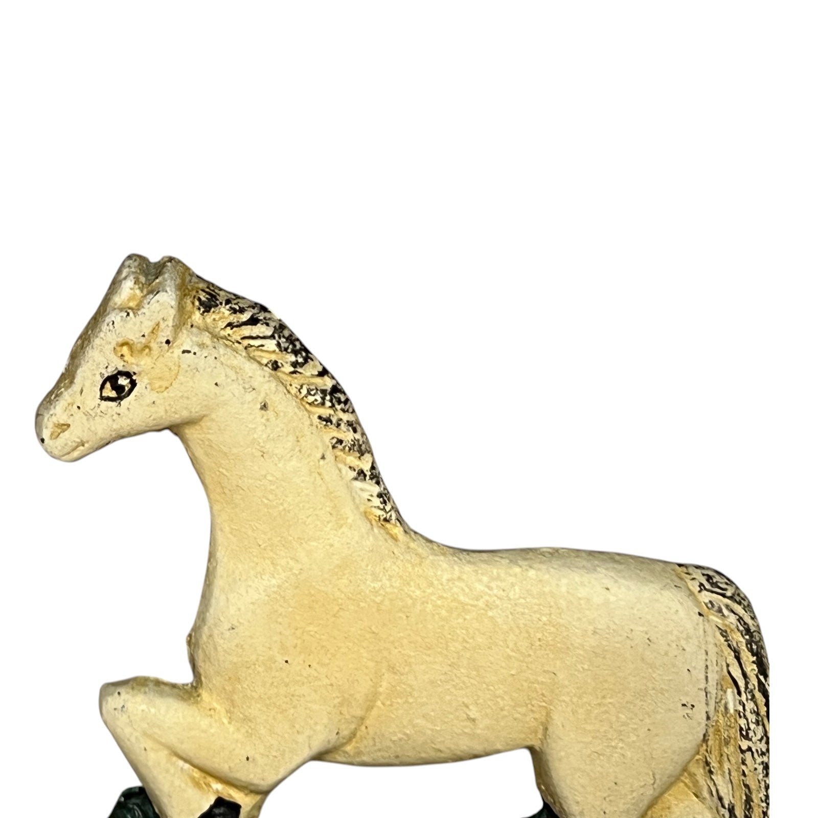 close up of cast iron toiler roll holder on a white background