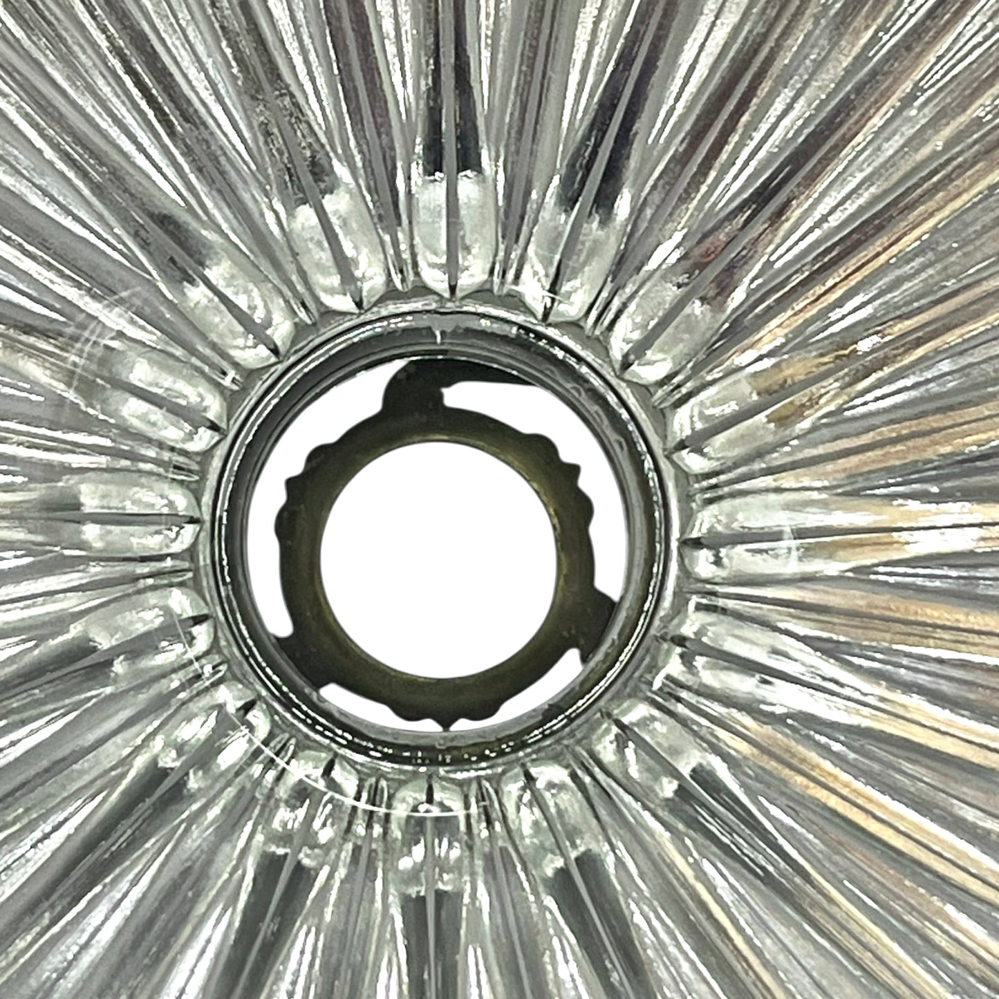 Close-up of a ribbed glass lampshade