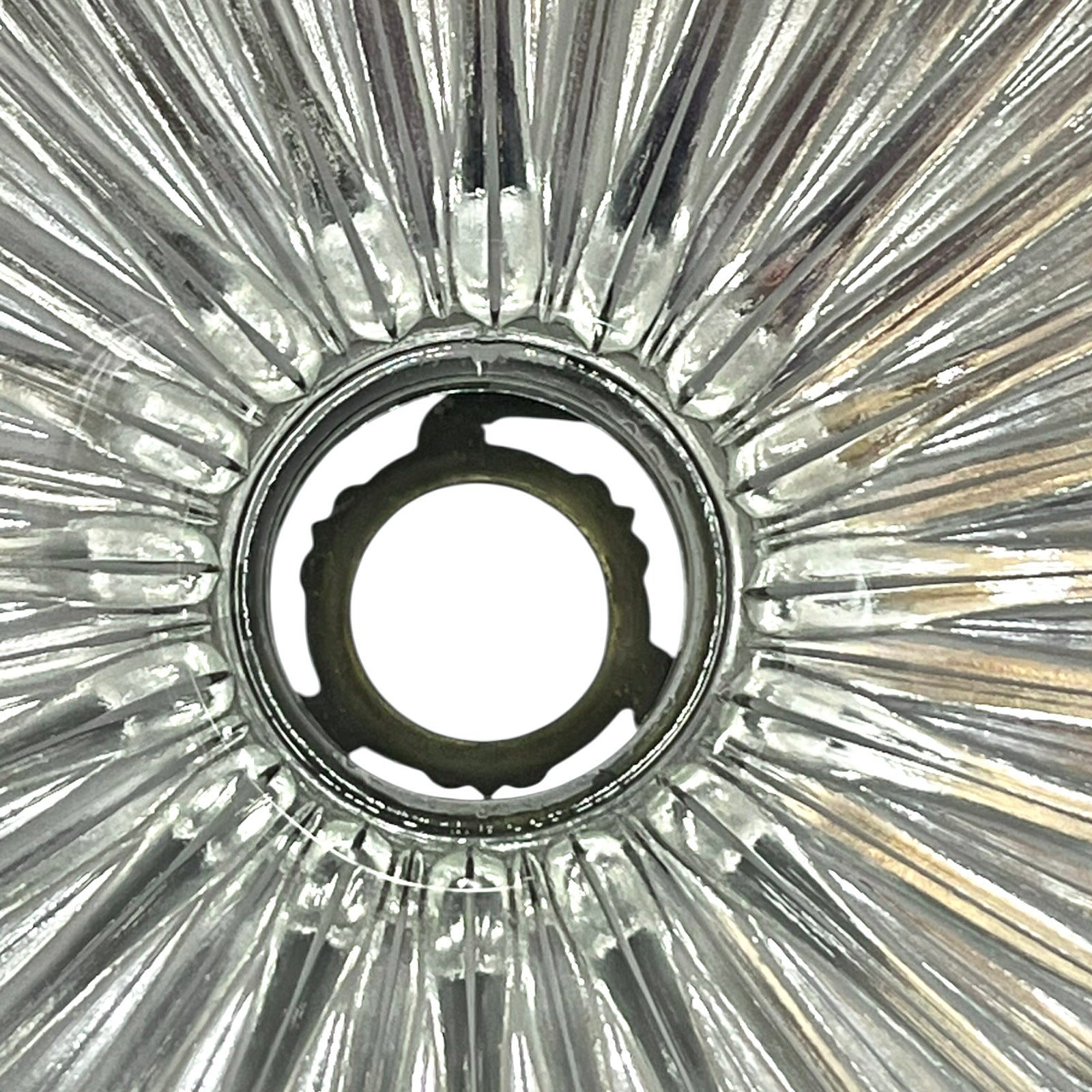 Close-up of a ribbed glass lampshade