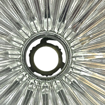 Close-up of a ribbed glass lampshade