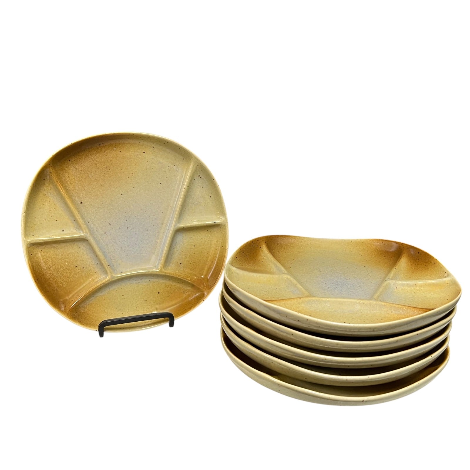 Set of 6 brown mid century ceramic divided plates with a textured finish on a white background