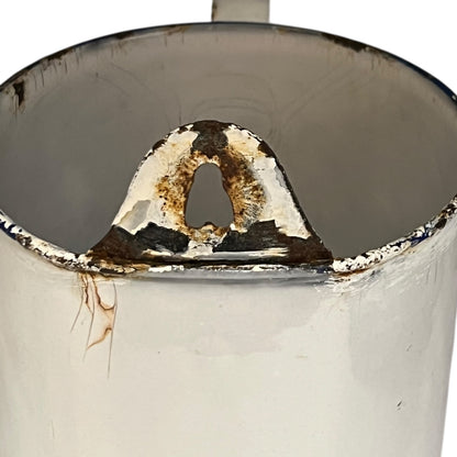 close up image of vintage planter hanging hole