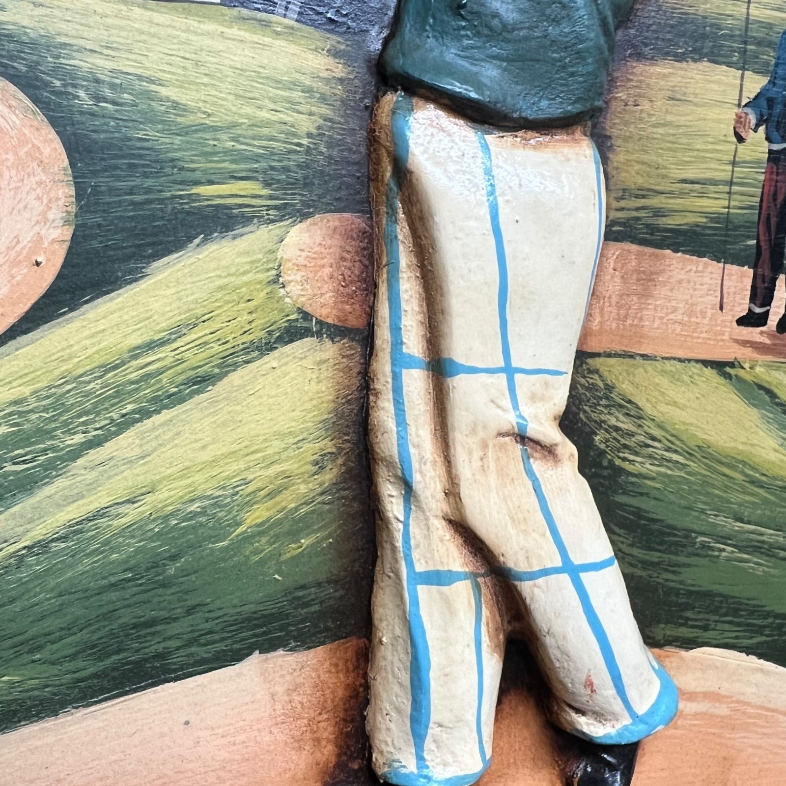 Close-up of a picture of a person wearing checkered pants with a blurred background