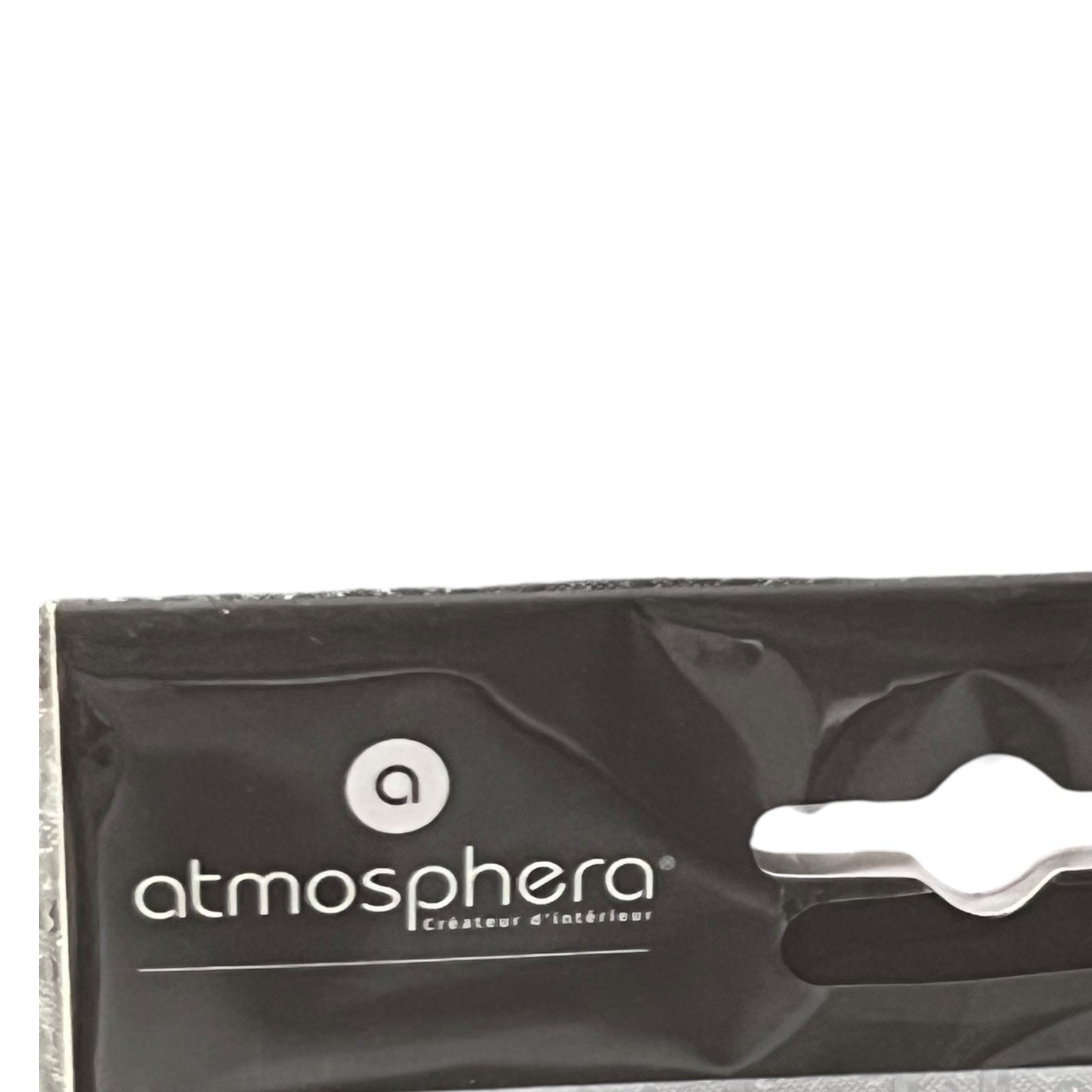 Black packaging with 'atmosphera' logo on a white background