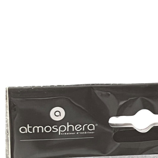 Black packaging with 'atmosphera' logo on a white background