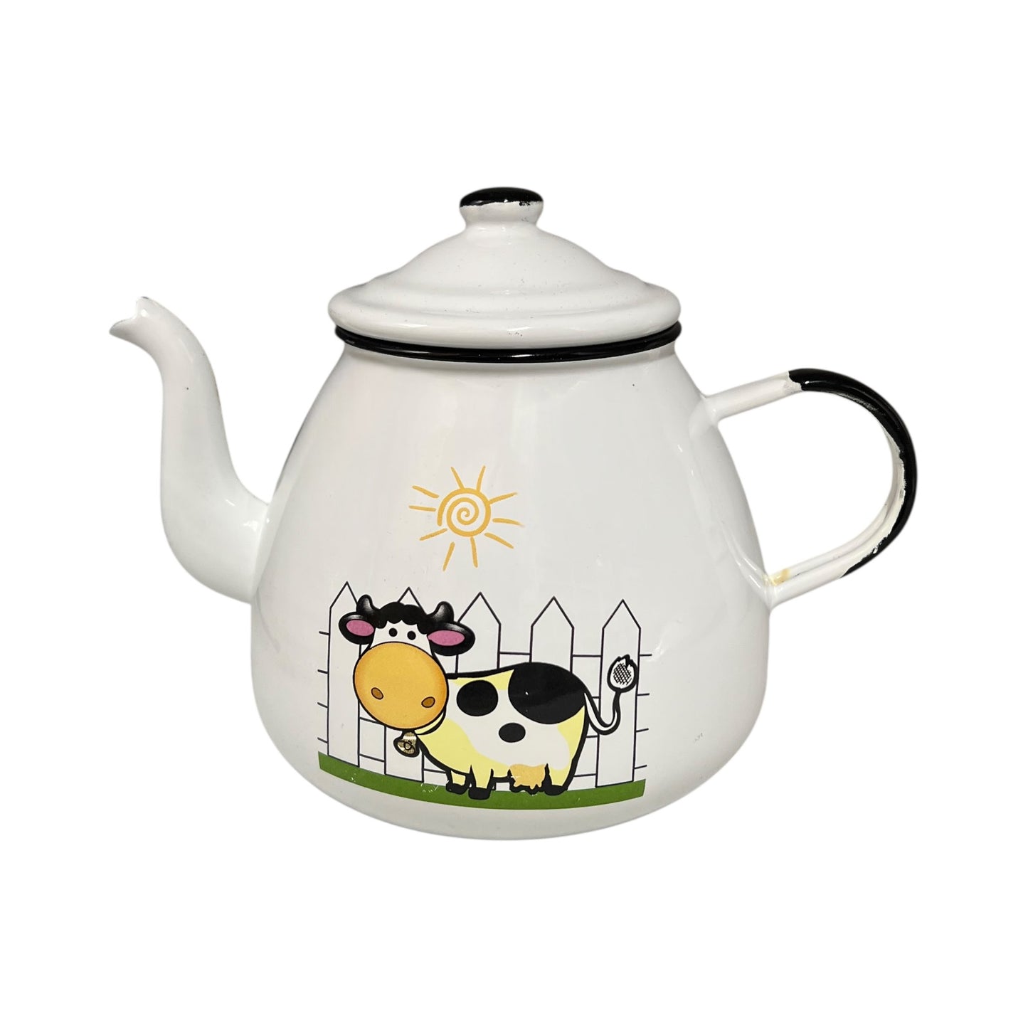 Teapot with cartoon cow design on a white background