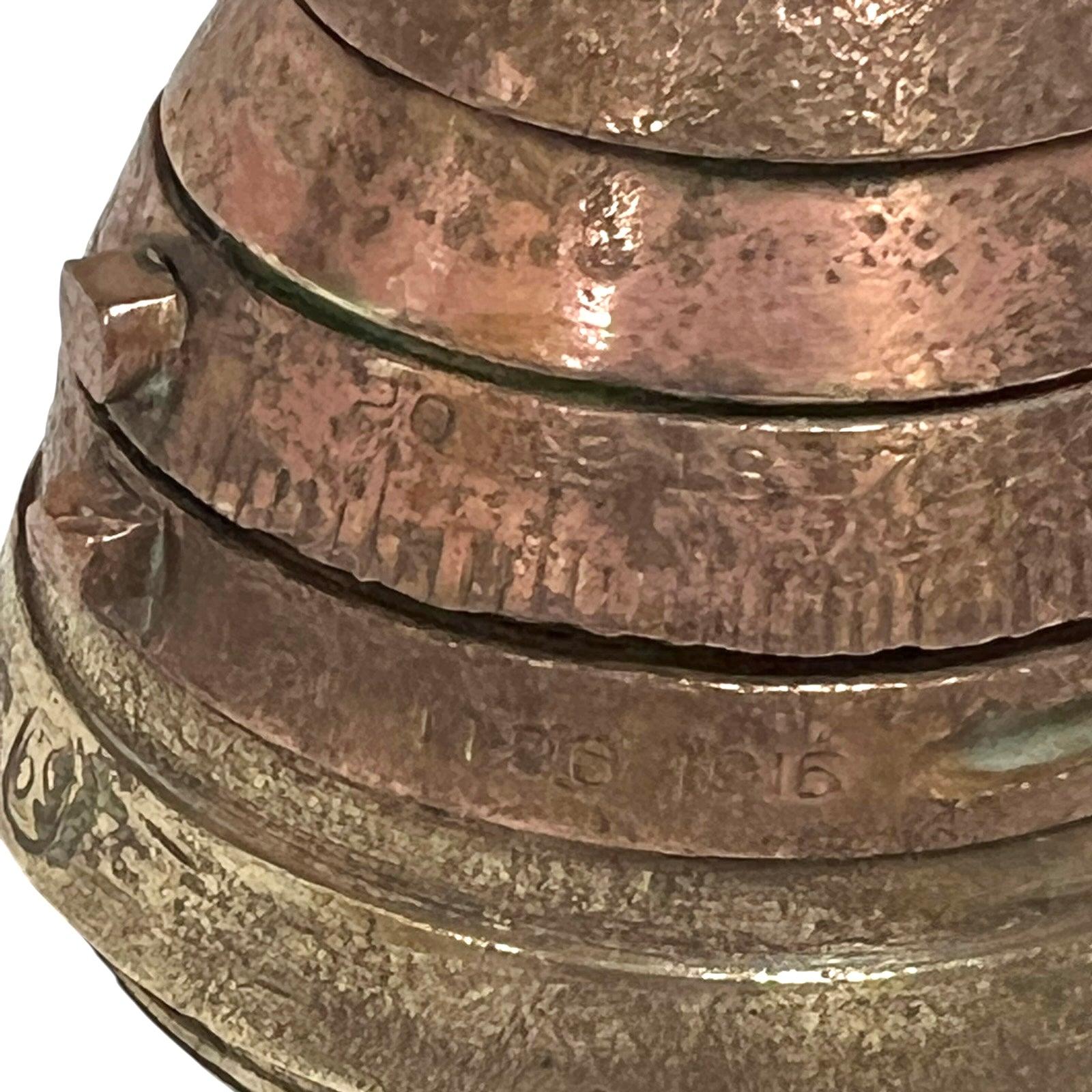 WW1 brass fuse paperweight on a white background