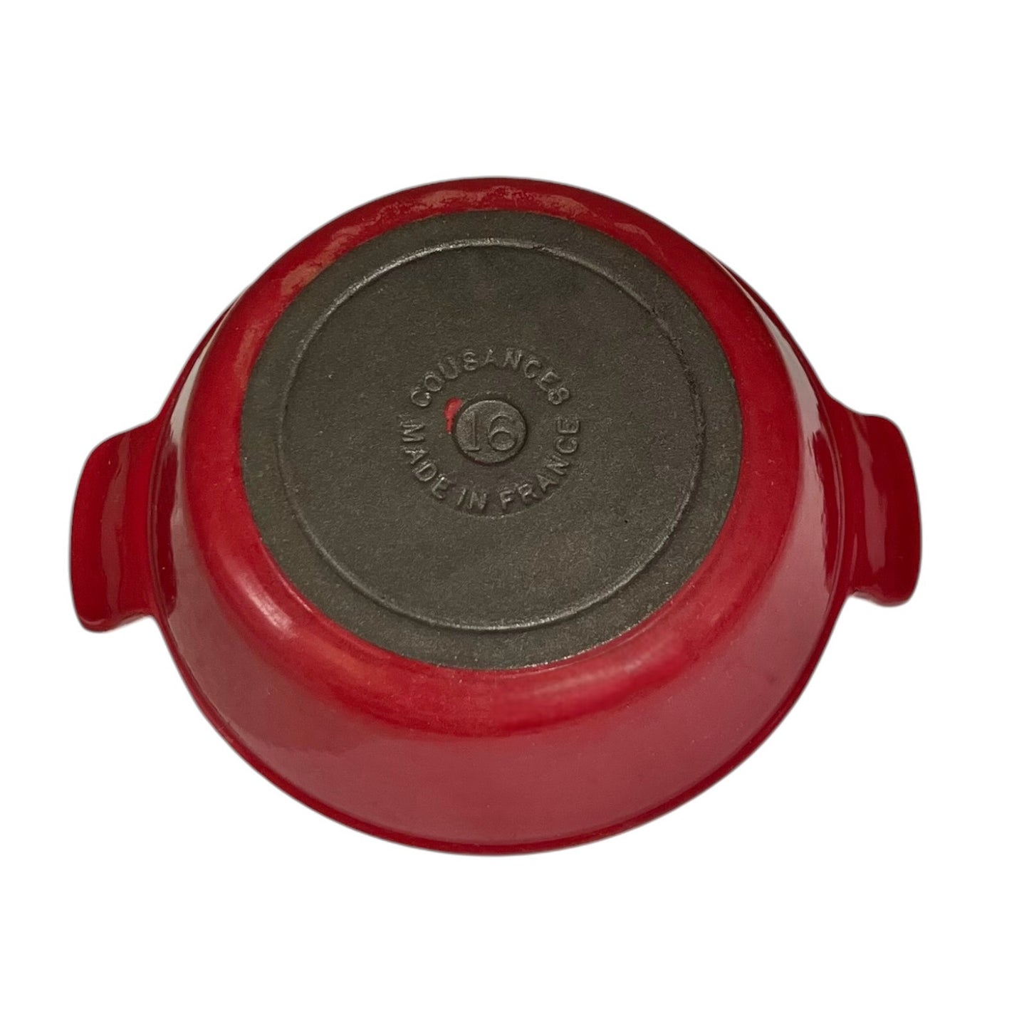 Red enameled cast iron casserole dish shown from the bottom, featuring side handles and a dark gray non-stick coated bottom with embossed 'COUSANGES MADE IN FRANCE' text.