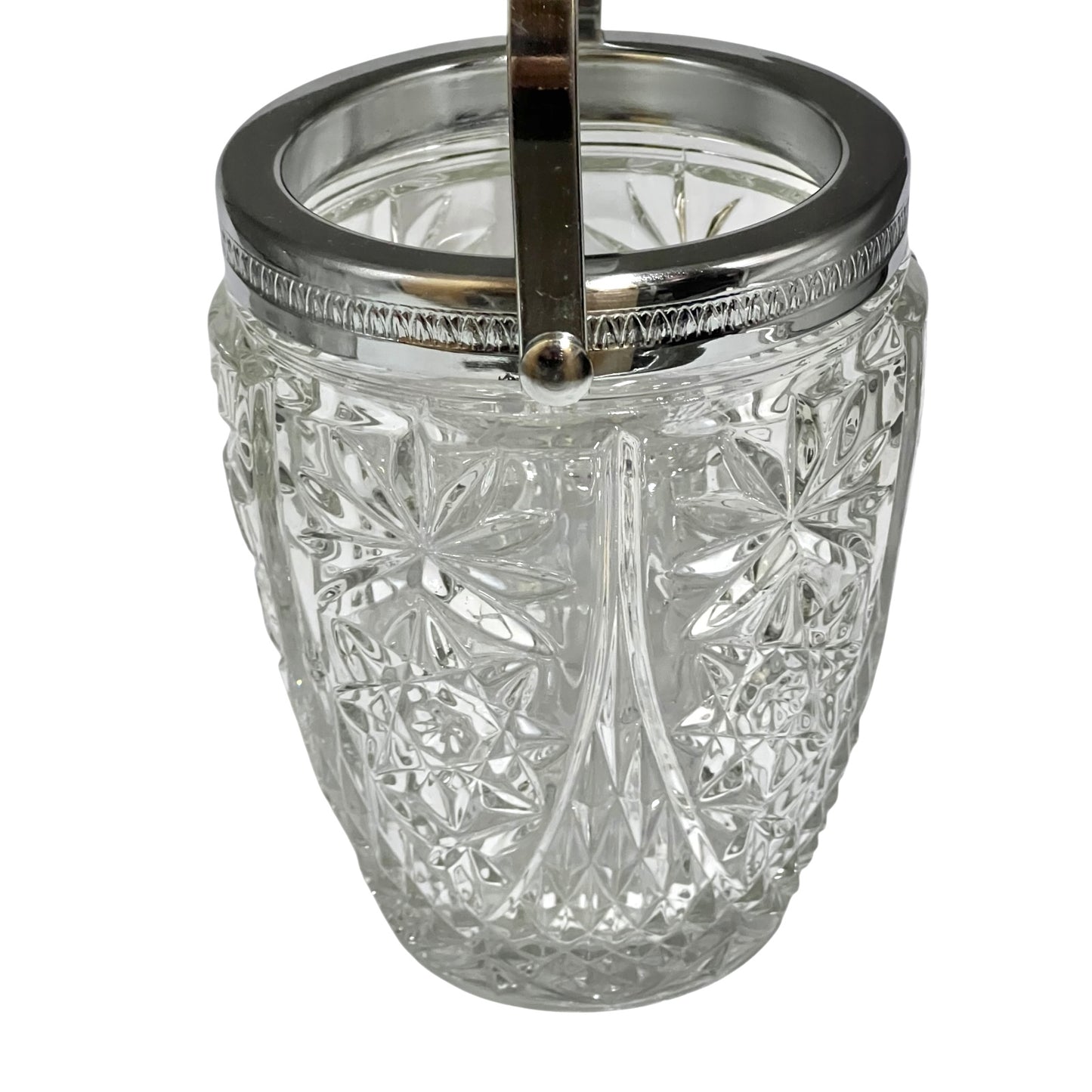 Decorative glass vintage ice bucket with metal collar and handle on a white background