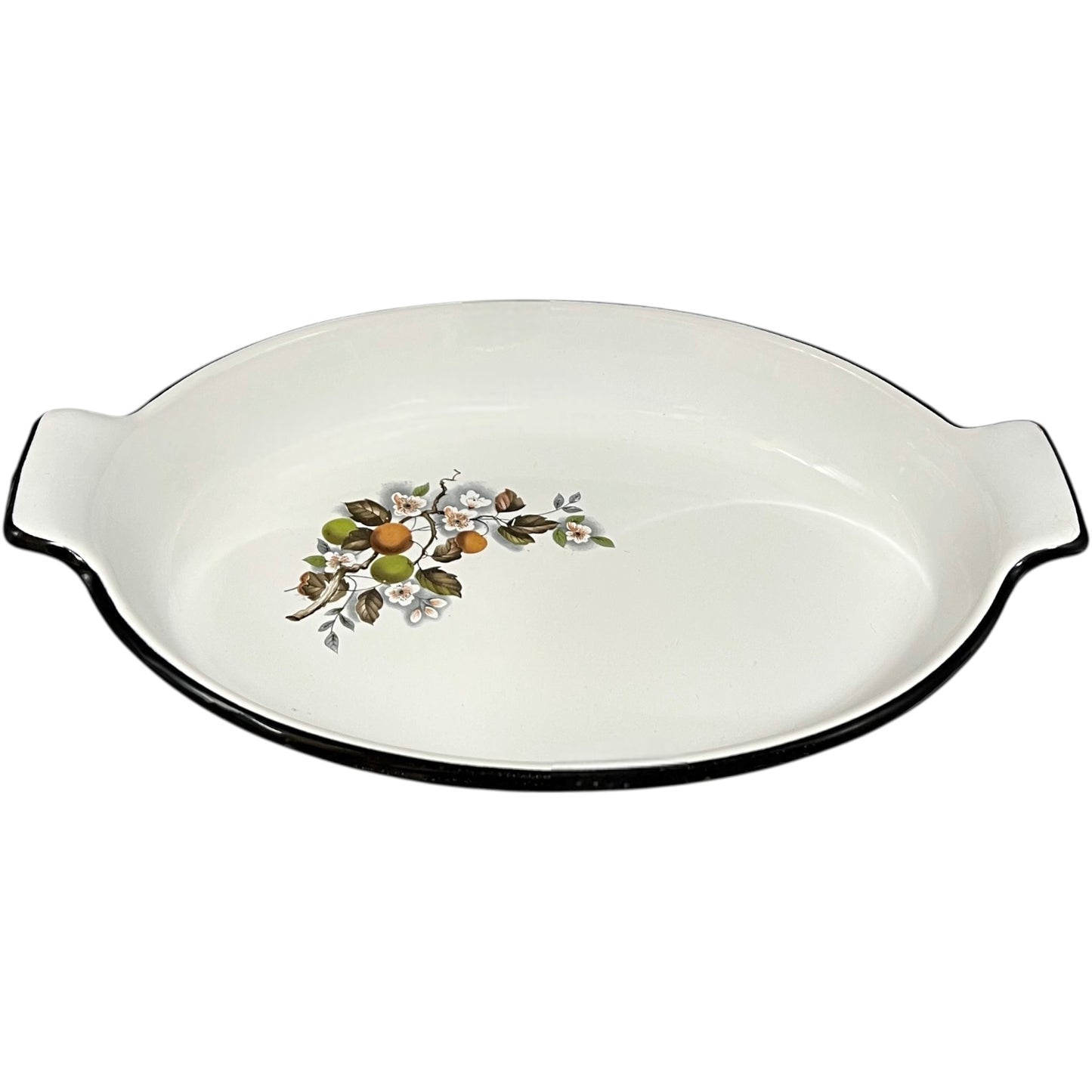 White enamel dish with floral design on a white background