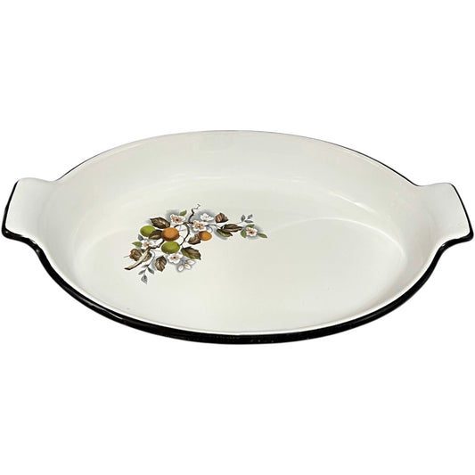 White enamel dish with floral design on a white background