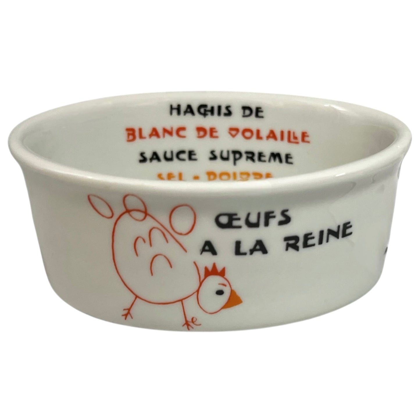 White ceramic ramekin with chicken illustration and text on a white background
