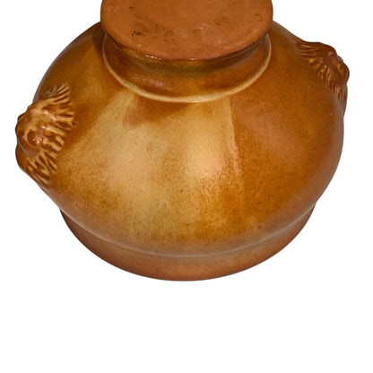 Brown ceramic bowl on a white background