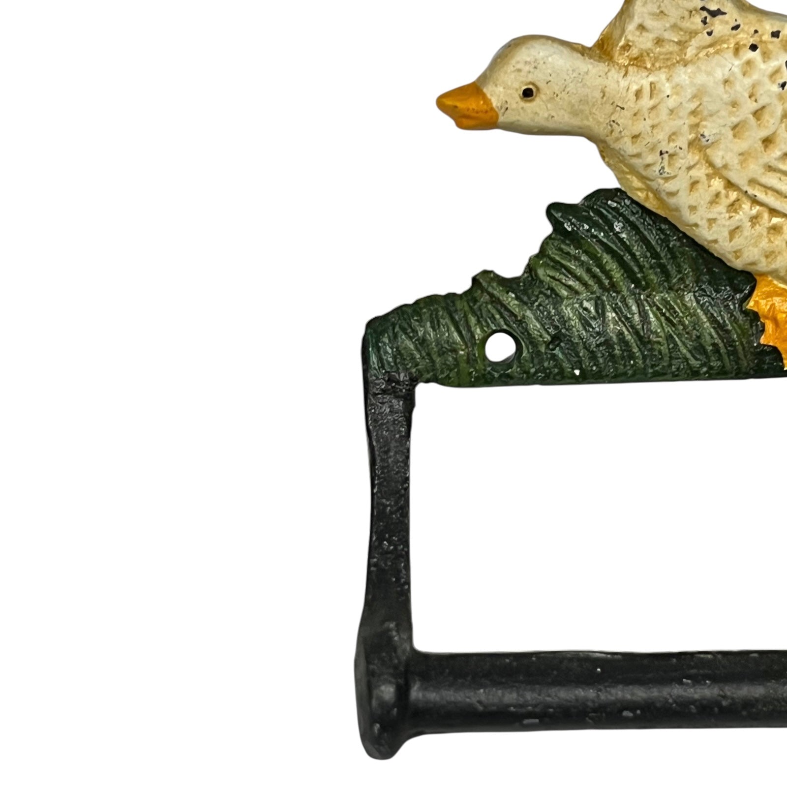 Close up of toilet roll holder with a goose design on a white background