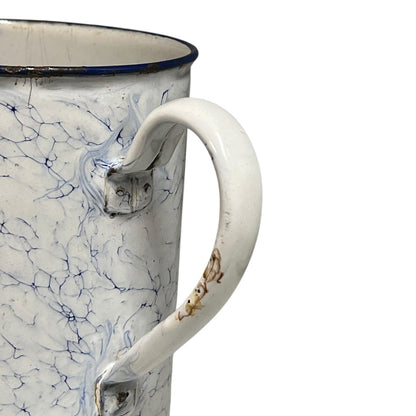 Close up of a French enamel vintage garden wall mounted planter or kitchen bathroom storage pot, on a white background 