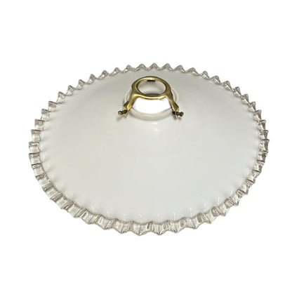 A white glass lampshade with a scalloped edge and gold fixture, perfect for adding a touch of period charm or retro flair to any home, set against a clean white background.