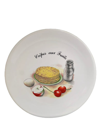 French crepes aux fruits plate on a white background 