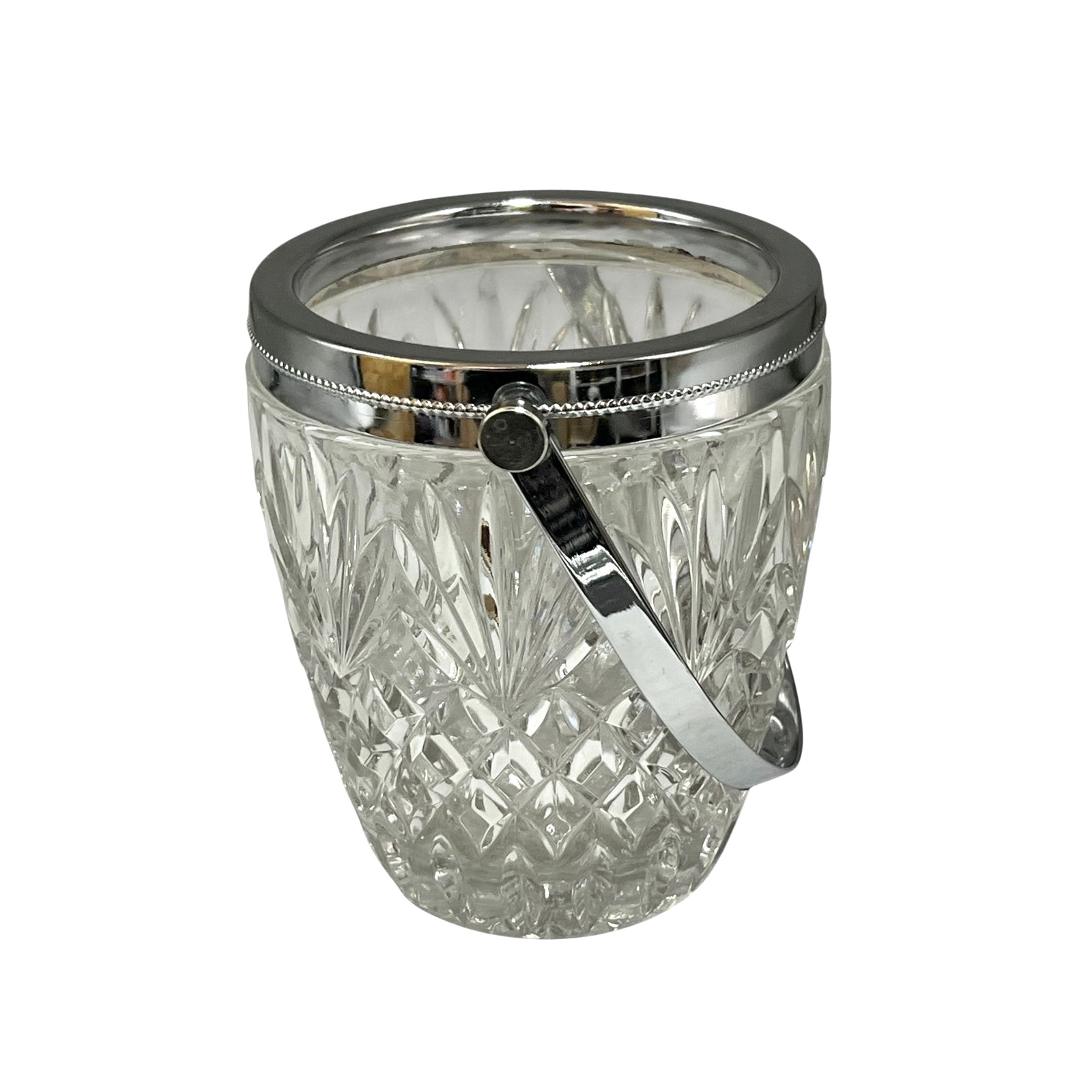 Crystal glass ice bucket with silver rim on a white background