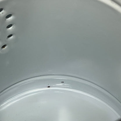 Close-up of a red teapot on a white background