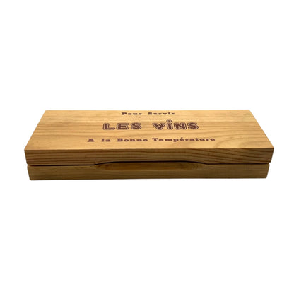 Wooden wine cooler with engraved text on a white background