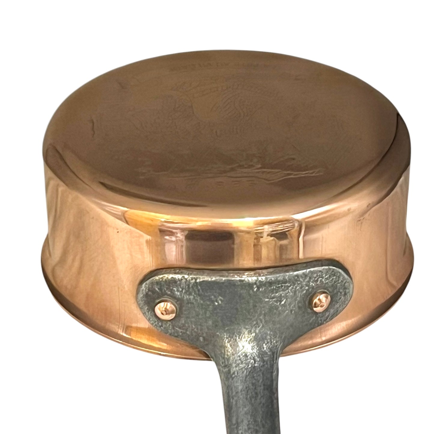 Copper saucepan with a handle on a white background