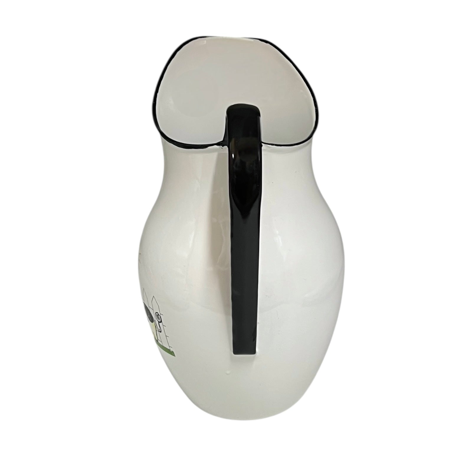 White pitcher with a black handle on a white background