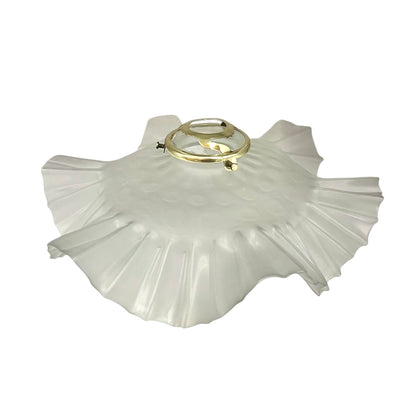 French vintage frosted glass lampshade with a frilled scalloped style edge and a brass collar on a white background