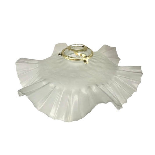 French vintage frosted glass lampshade with a frilled scalloped style edge and a brass collar on a white background