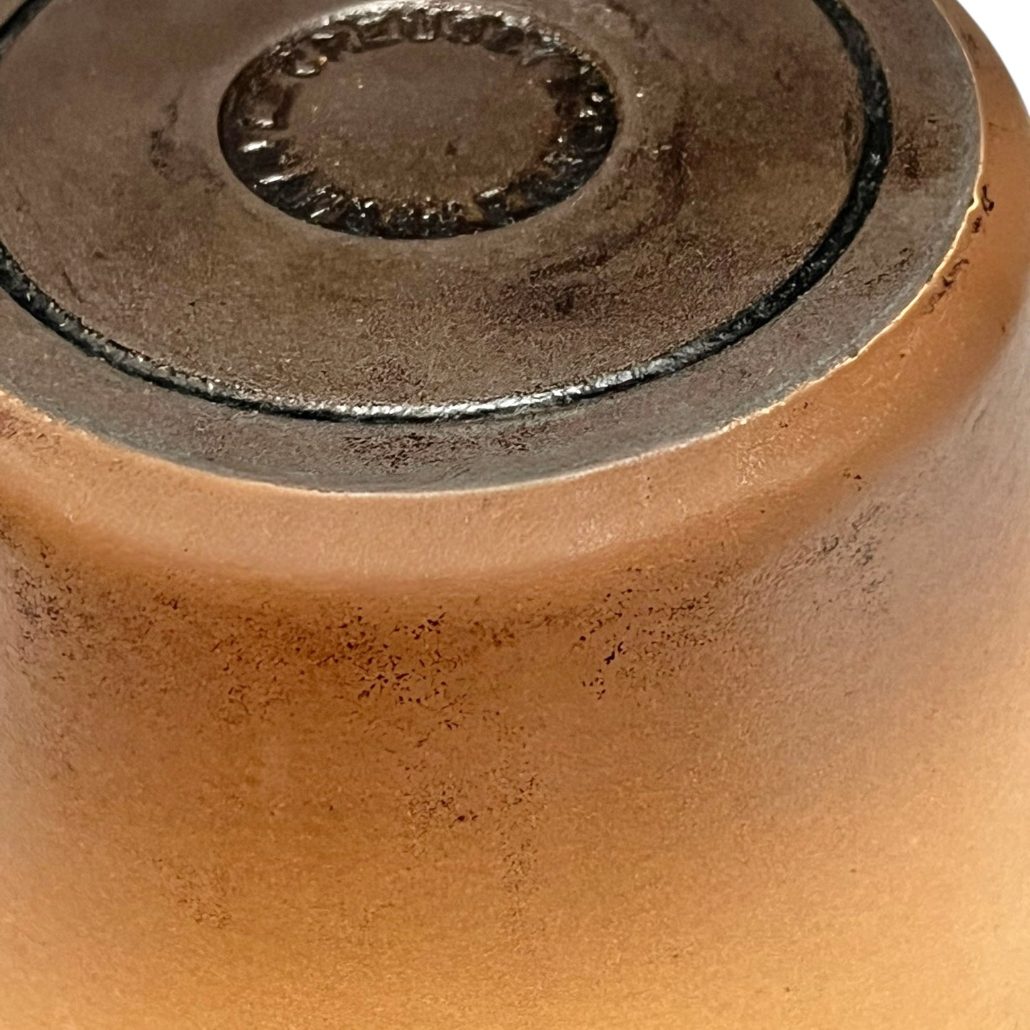 Close up of Le Creuset pan on a white background