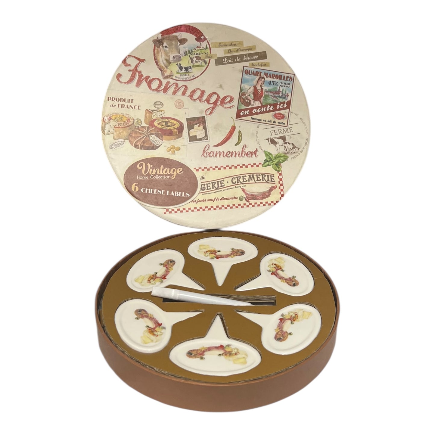 Round cheese board set with decorative labels on a white background