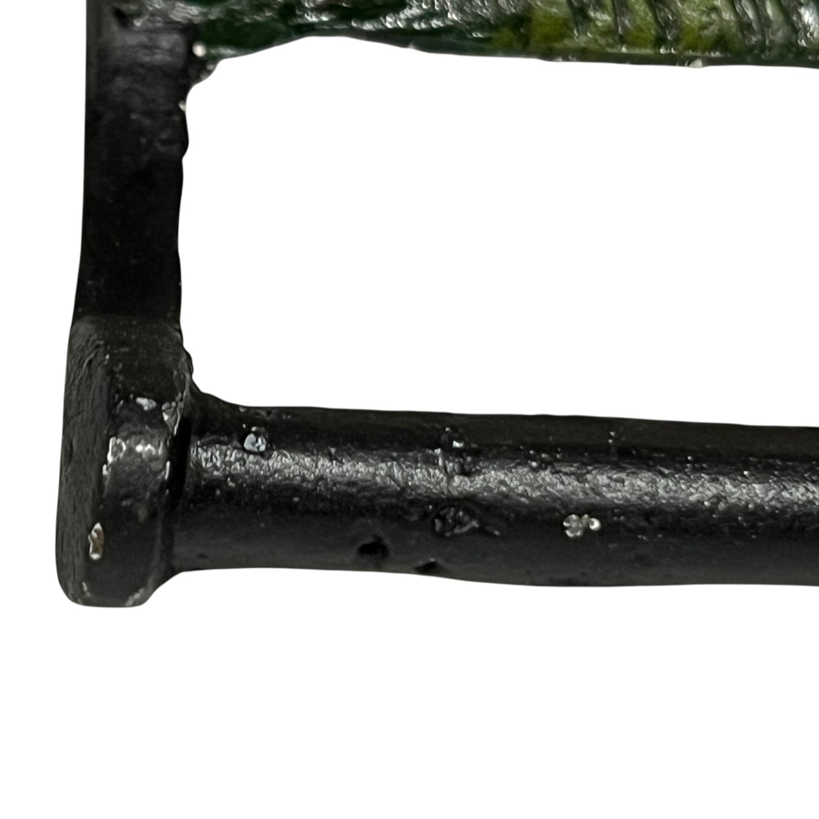 Close up of white horse toilet paper holder against a white background
