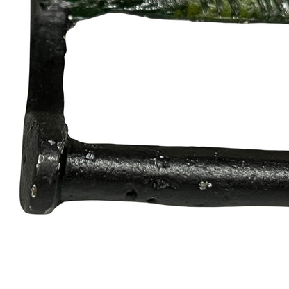 Close up of white horse toilet paper holder against a white background