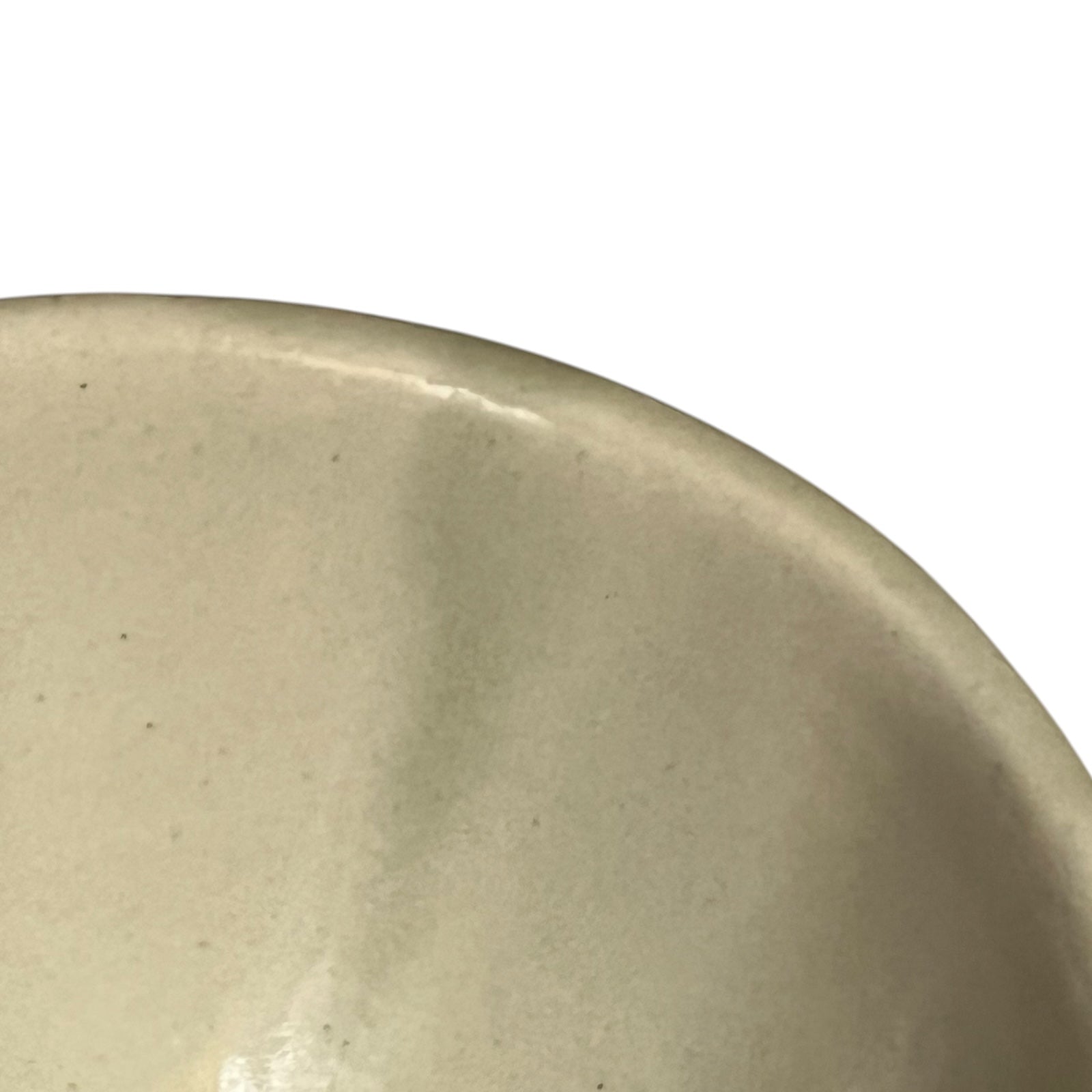 Beige ceramic dish with floral design and 'L'avocat' text on a white background