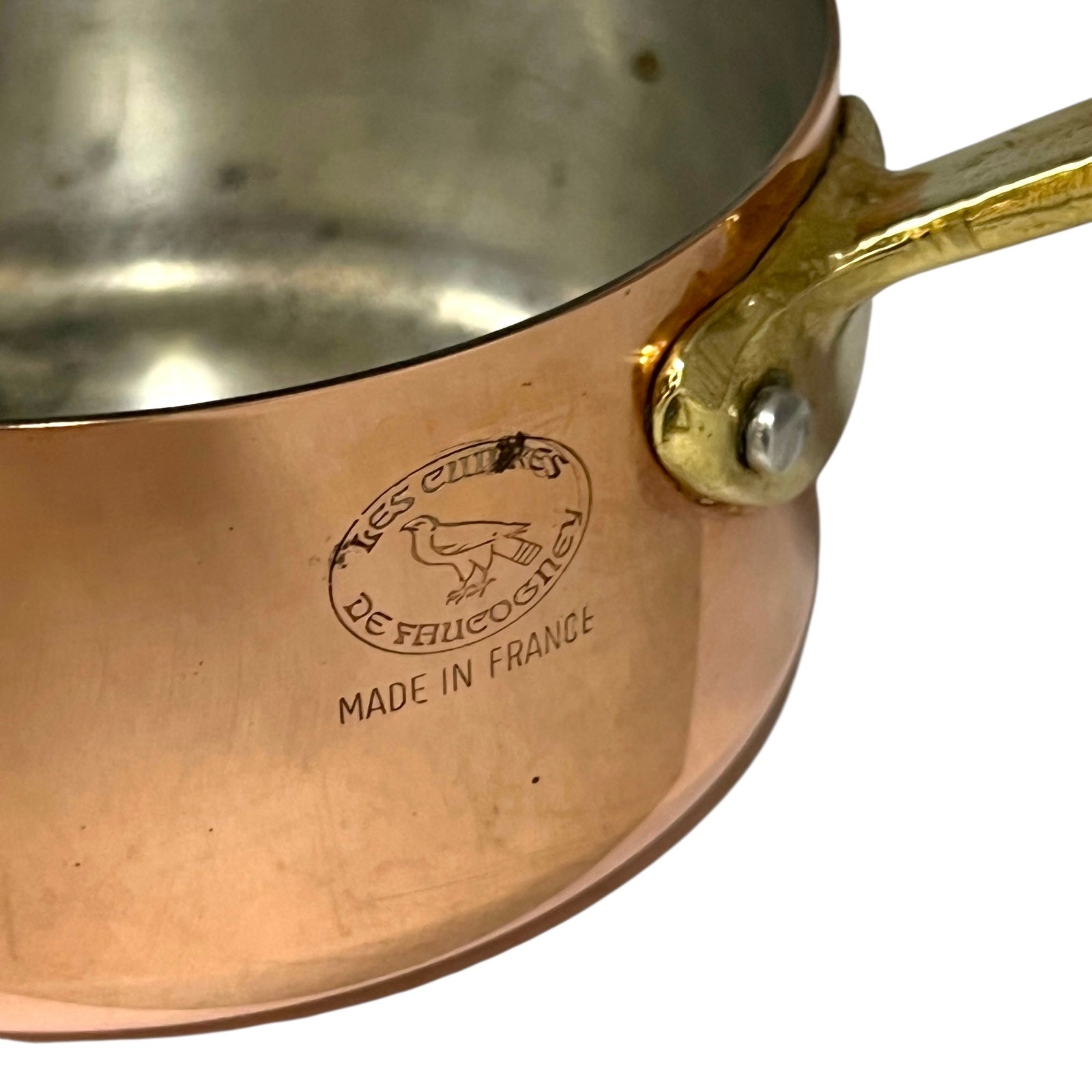 makers stamp on copper pan 