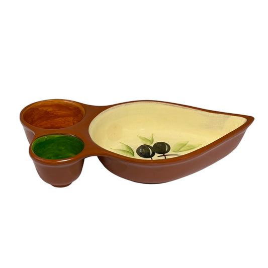 A ceramic three-compartment serving tray with a leaf-like shape, featuring a large cream-colored interior with a painted olive branch design, two brown outer compartments, and one small green cup, shown on a white background.