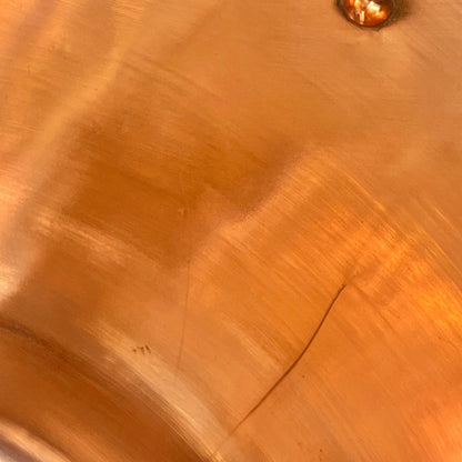 Copper upcycled basin sink or washbowl showing wear and tear