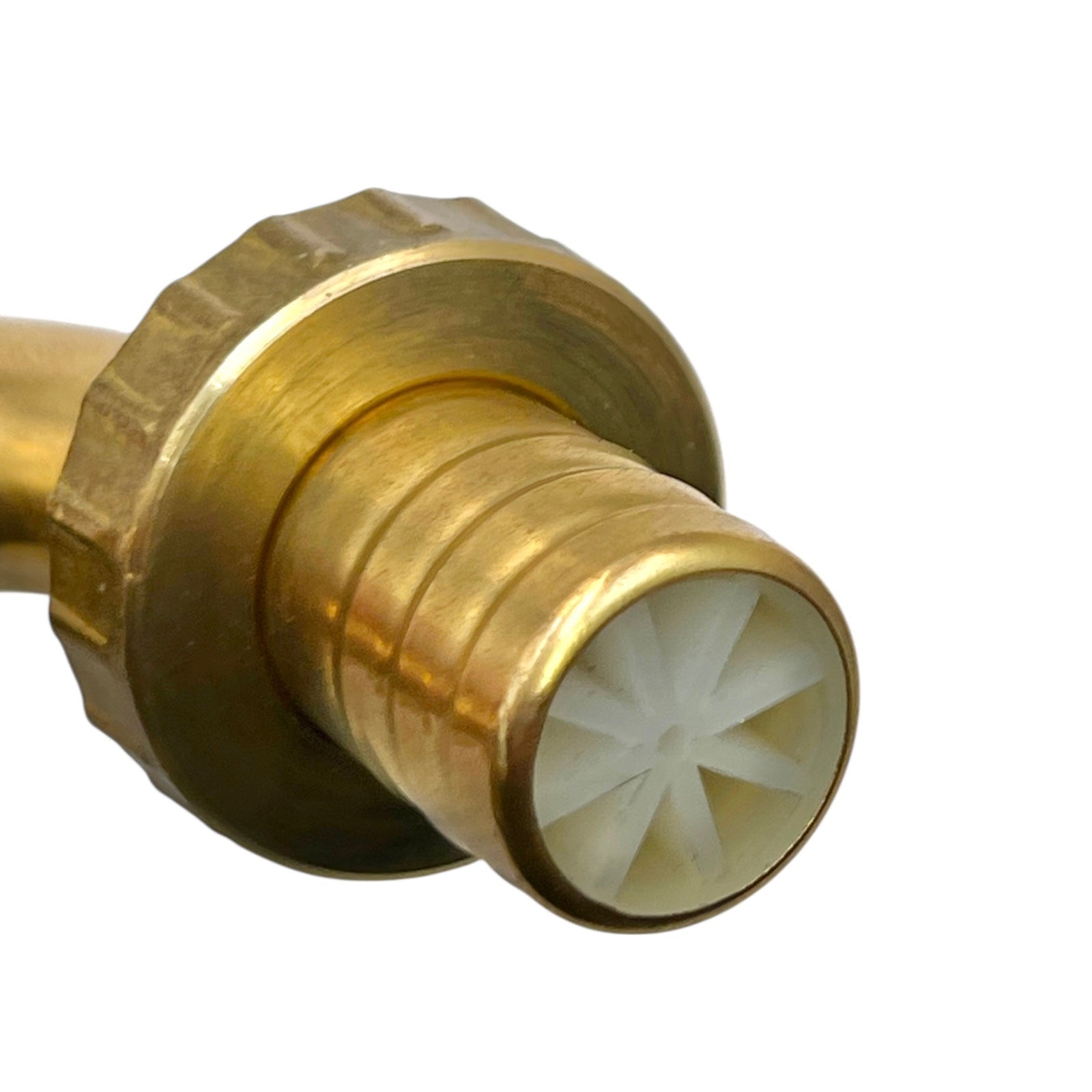 A close-up of a brass hose connector fitting with a white plastic internal valve, shown on a plain white background.