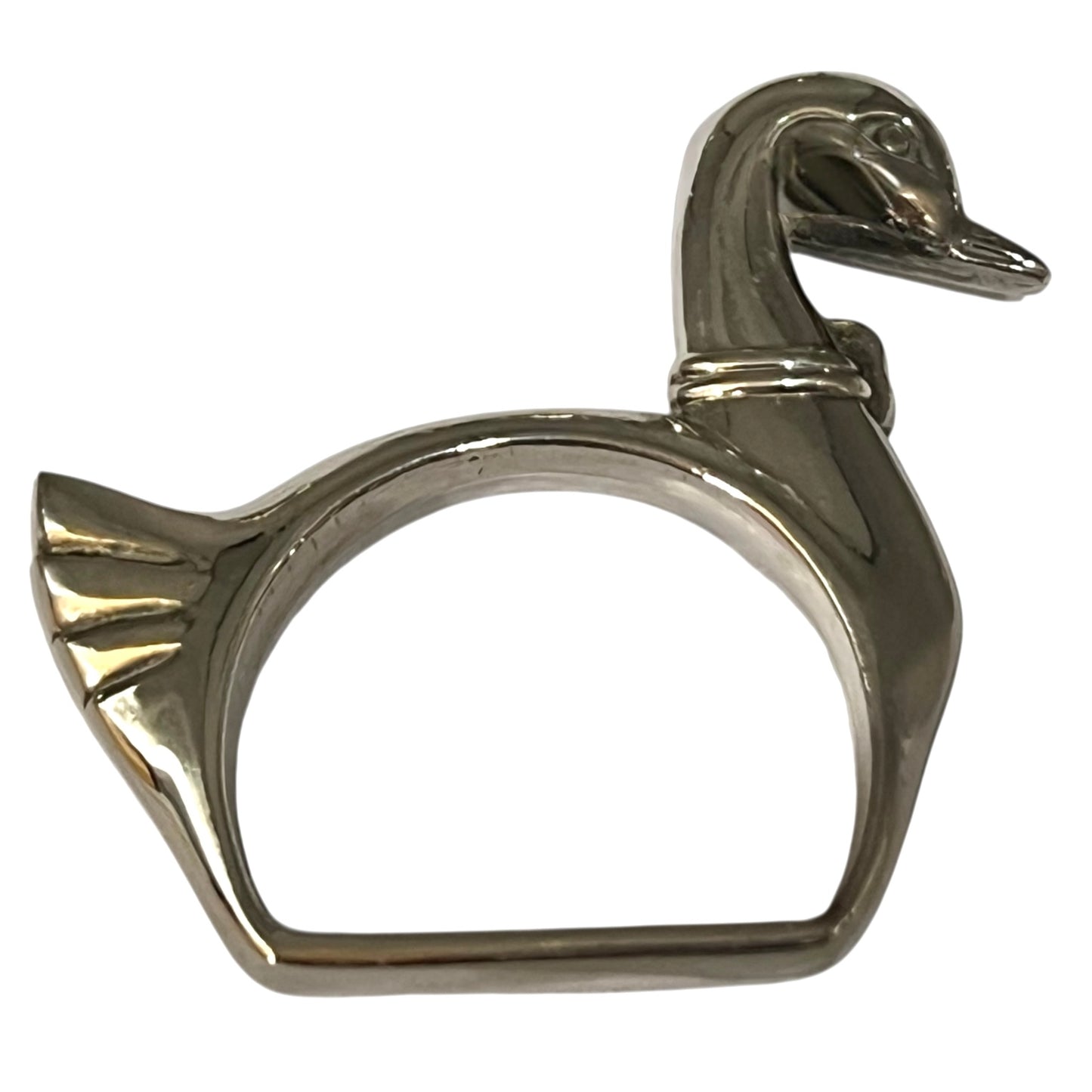 Silver swan-shaped napkin ring on a white background
