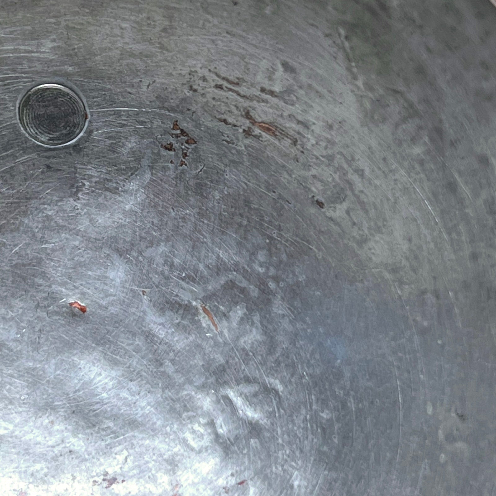 close up inside view of copper ladle