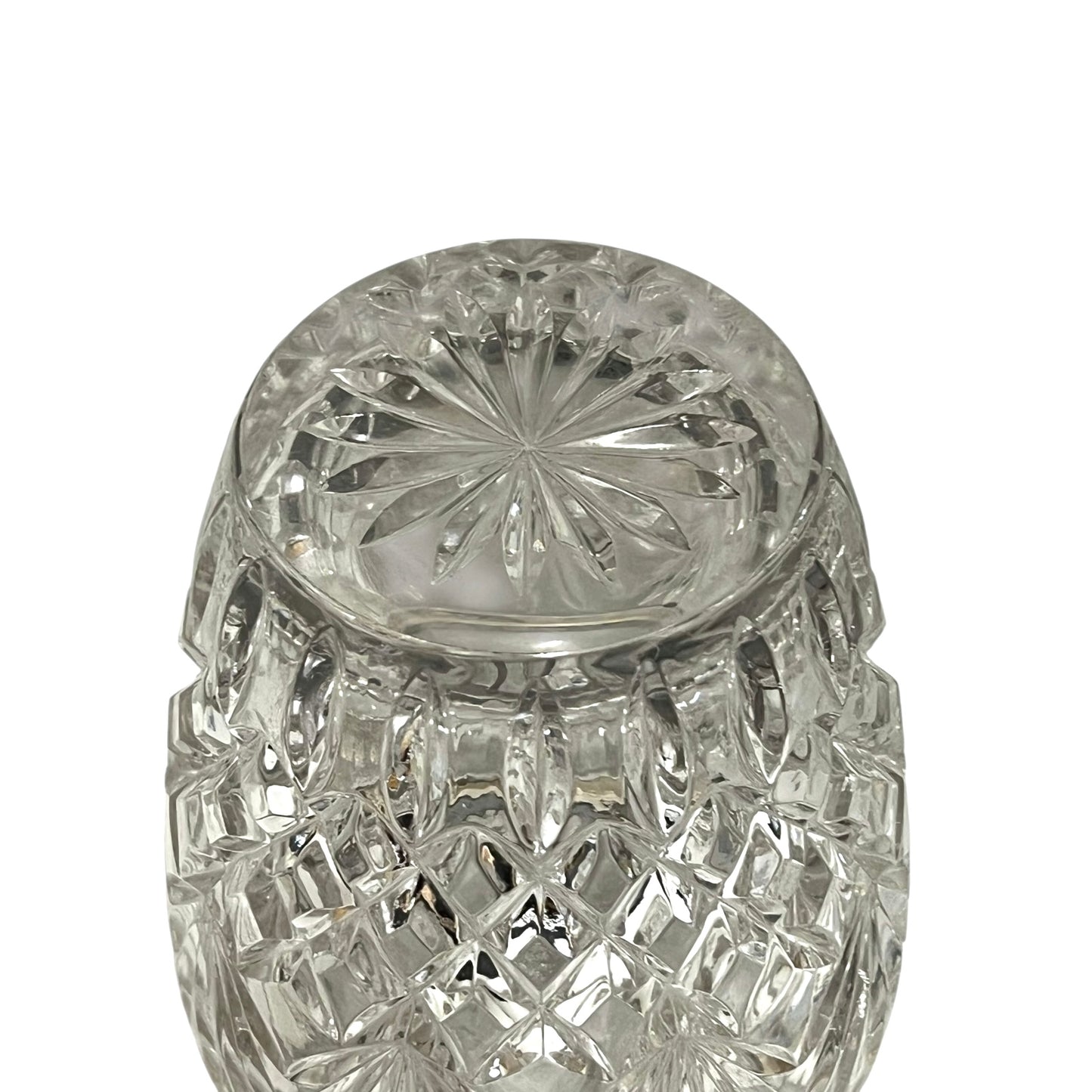 Close up of a French vintage glass ice bucket with silver rim on a white background
