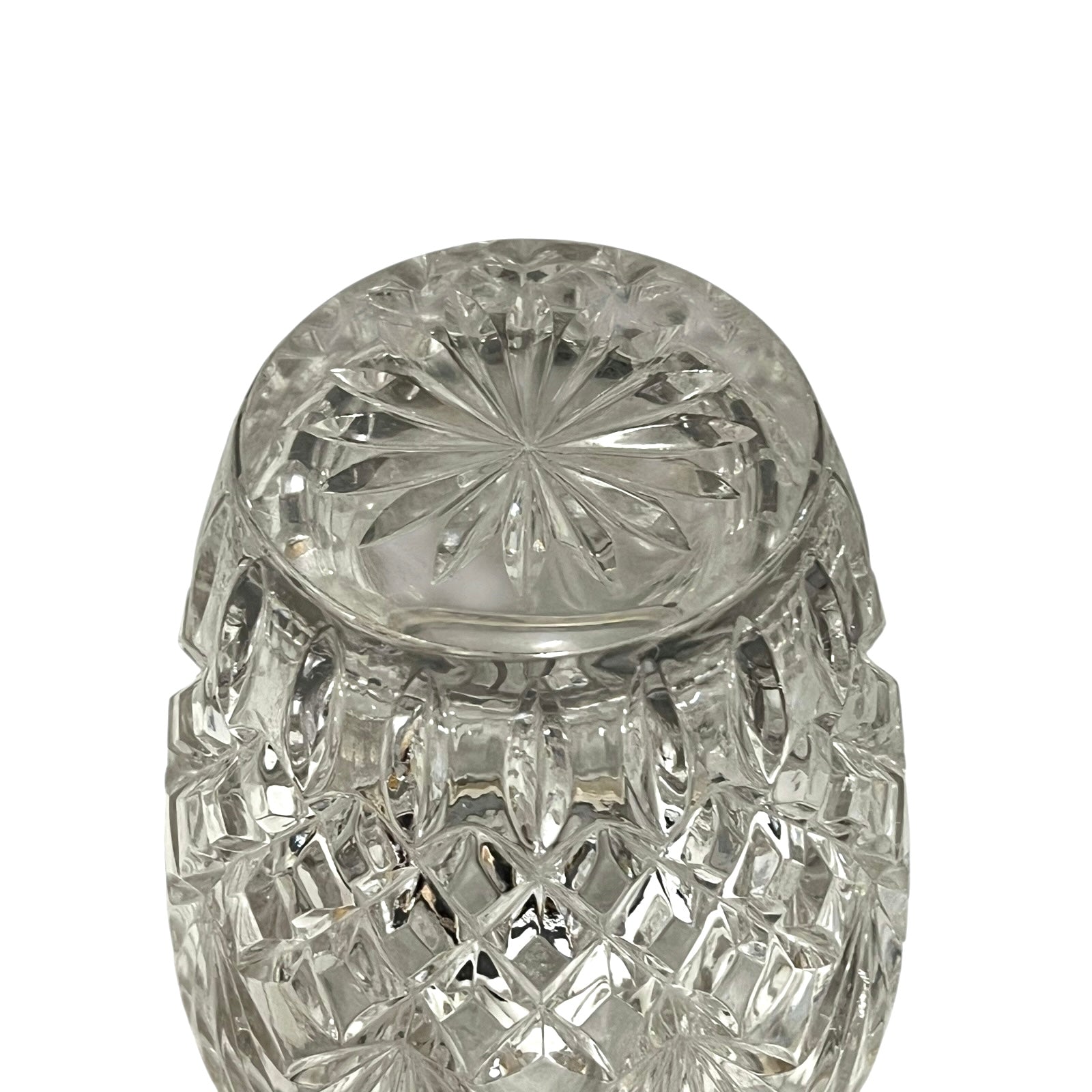 Close up of a French vintage glass ice bucket with silver rim on a white background