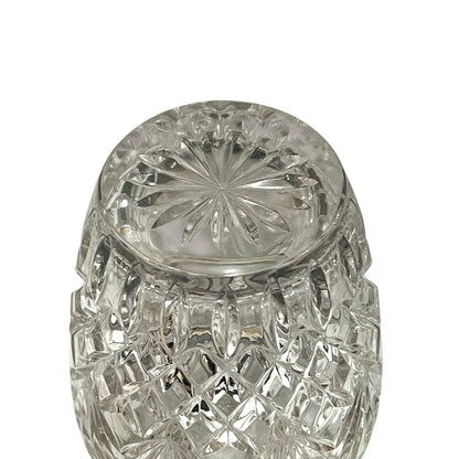 Close up of a French vintage glass ice bucket with silver rim on a white background