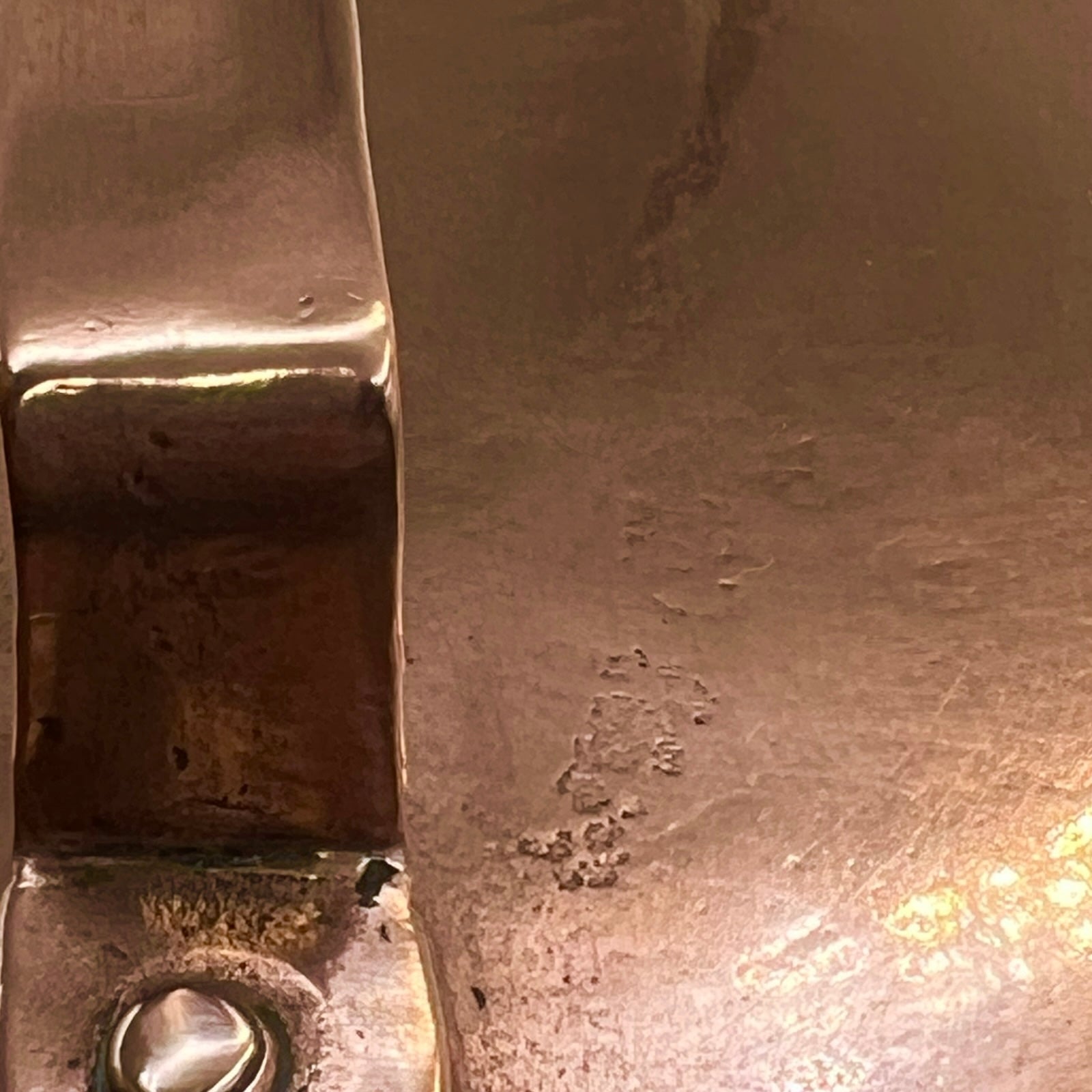 Close up of a copper cooking pot stockpot with handles on a white background